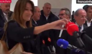 Carla Bruni furious: Pushes down reporter’s microphone after Sarkozy conviction