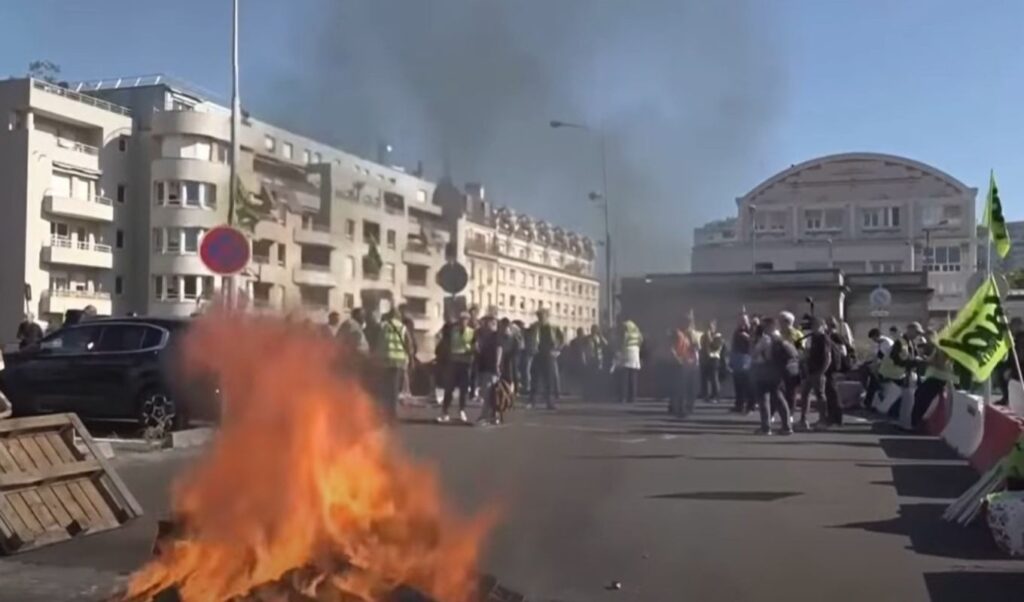 France strikes turn violent: Mass protests over budget cuts lead to dozens of arrests