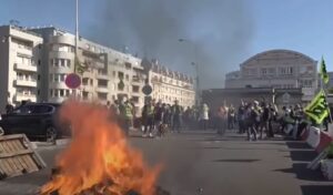 France strikes turn violent: Mass protests over budget cuts lead to dozens of arrests