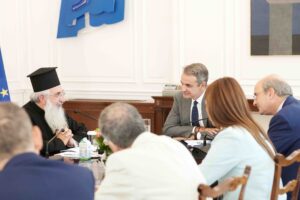 Greek PM rejects church amendment withdrawal in Crete meeting