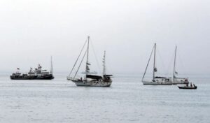 Greek activists from Gaza flotilla return home as Israel deports 170