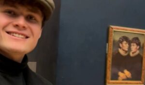 Belgian TikTokers hang self-portrait near Mona Lisa at Louvre