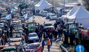 Greek farmers accept PM meeting as nationwide road blockades continue