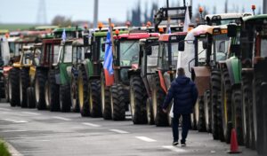 Greek farmers paralyze country with triple highway blockade