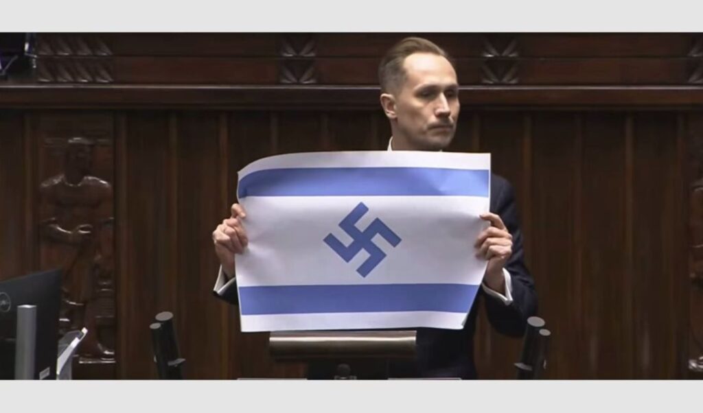 Polish MP displays Israeli flag with swastika in parliament