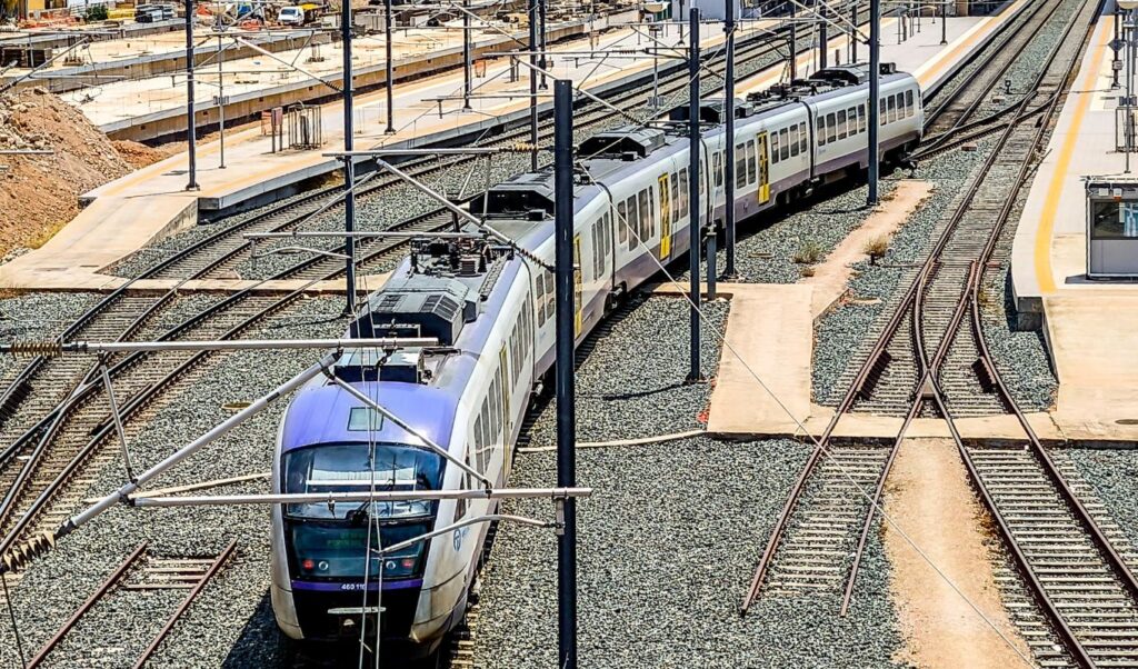 Suburban train chaos after man threatens suicide on power cables