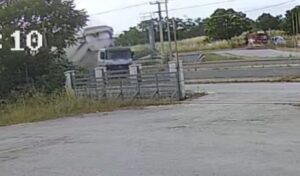 Truck destroys bridge and crashes into car lot in Greece accident