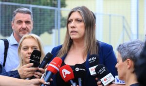 Zoe Konstantopoulou stands with hunger striker Aristotle Chantzis