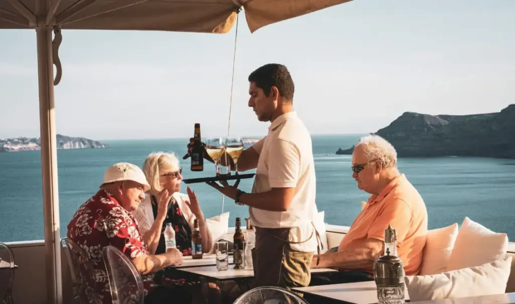 Greece’s two-speed tourism: Record profits, 2011-era wages for workers