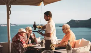 Greece’s two-speed tourism: Record profits, 2011-era wages for workers