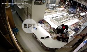 Brave employee chases armed robber with a mop in Greek bakery