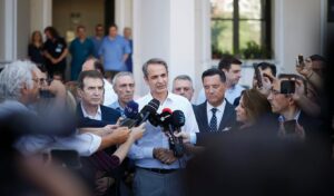 Greece demands arrests after deadly arson attack on ruling party officials