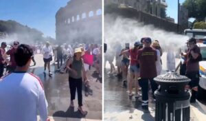 Rome sizzles at 40°C: Tourists sprayed with water outside the Colosseum as heatwave kills five