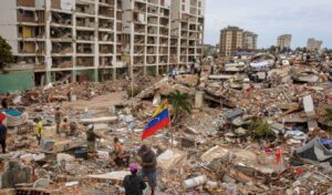Venezuela earthquake: families search for loved ones as rescue teams withdraw 12 days later