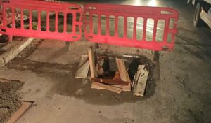 Truck falls into manhole on Iera Odos, creating road crater — Traffic disrupted